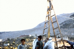 Tall ladder used (precariously) to photograph whole area. (1962, ID: cColepShechem014, Source: slide, Repository: NPAPH-project, Creator(s): Dan P. Cole)