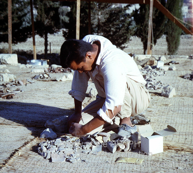 Potshed; Each basket's sherds dried in sun, most diagnostic ones boxed (Next steps in process shown on slides cColepHaliv107-109). (1960, ID: cColepShechem021, Source: slide, Repository: NPAPH-project, Creator(s): Dan P. Cole)
