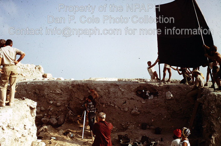 Fld III; Six volunteers hold up cloth to shade area to be photographed. (1970, ID: cColepGezer072, Source: slide, Repository: NPAPH-project, Creator(s): Dan P. Cole)