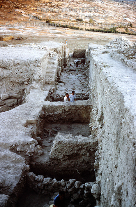 Fld I; Teams in row of 4 areas digging occupation layers inside and outside MB city wall, to be seen between the two pairs of workers. (1968, ID: cColepGezer082, Source: slide, Repository: NPAPH-project, Creator(s): Dan P. Cole)