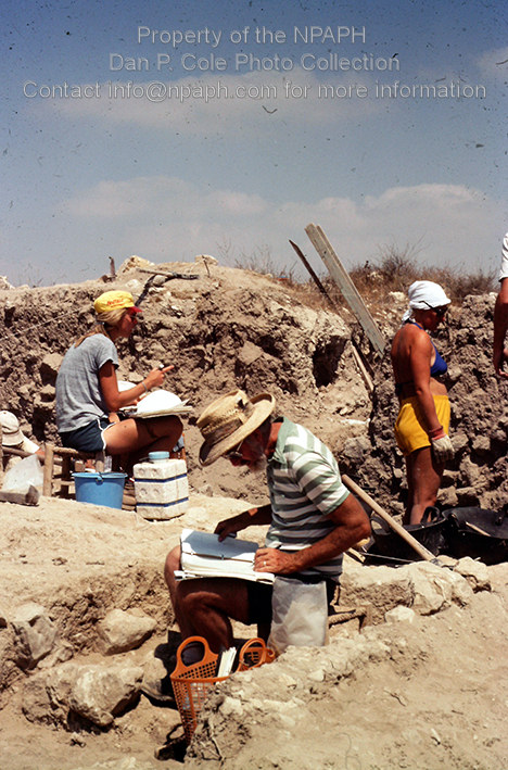 Fld I; Field and area supervisors recording notes as volunteers dig. (1979, ID: cColepHalif104, Source: slide, Repostitory: NPAPH-project, Creator: Dan P. Cole)