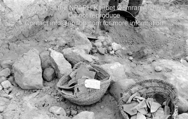 Baskets filled with fragments of pottery. Location unknown (21 March 1954; ID: cBoerpQumran12.13; Source: photo; Depository: NPAPH; Creator(s): Leo Boer)